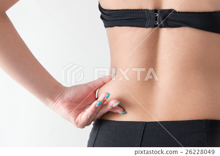 Woman touching the waist · White back 26228049