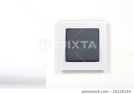 light switch with silver glass frame on the wall light switch with silver glass frame on the wall 26228149