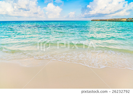 Beautiful water villas in tropical Maldives island at the sunrise time . 26232792