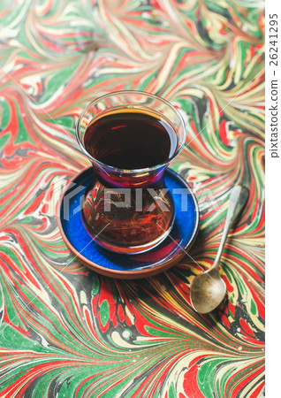 Turkish tea in traditional tulip glass and spoon 26241295