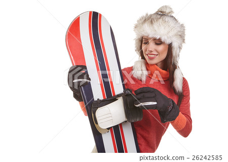 model wearing winter suit holding a snowboard 26242585