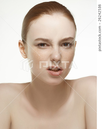 Emotional beauty portraits red-haired girl. 26242586