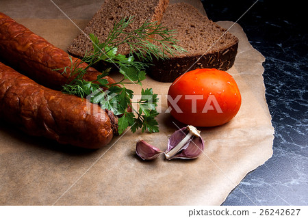 Close up view smoked sausage with spice, herbs Close up view smoked sausage with spice, herbs 26242627