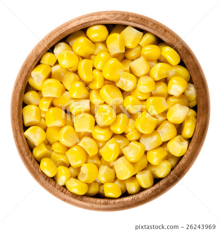 Sweet corn kernels in wooden bowl over white 26243969