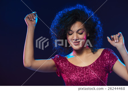 Woman dancing on a party 26244468