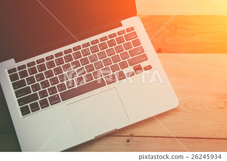 laptop on wooden table, work morning laptop on wooden table, work morning 26245934