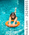 girl in the pool on a buoy 26246035