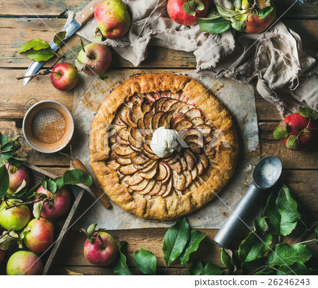 Apple crostata with cinnamon, ice-cream scoop and Apple crostata with cinnamon, ice-cream scoop and 26246243