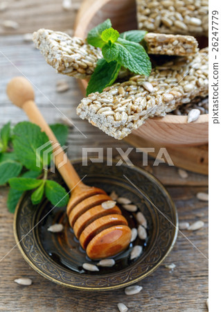 Sunflower seeds in honey. Sunflower seeds in honey. 26247779