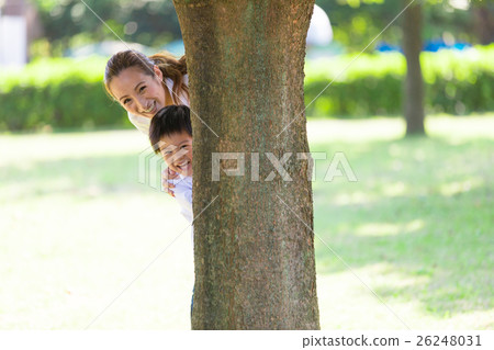 Mothers and children playing in the park Mothers and children playing in the park 26248031