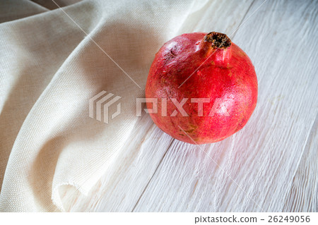 Whole pomegranate on white background Whole pomegranate on white background 26249056