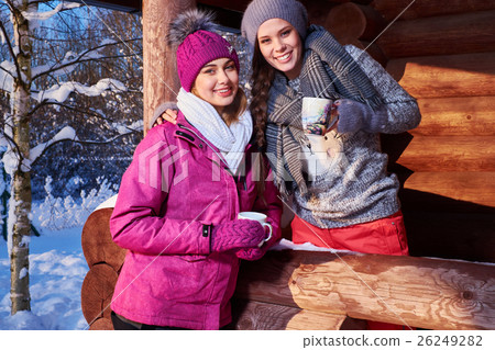 Happy girlfriends spend winter holidays at 26249282