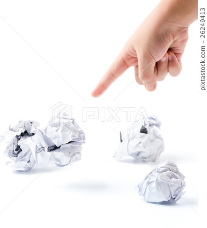 little hand pointed the finger to crumpled paper 26249413