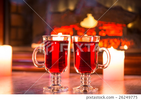 Beautiful Two glasses of mulled wine on bokeh 26249775