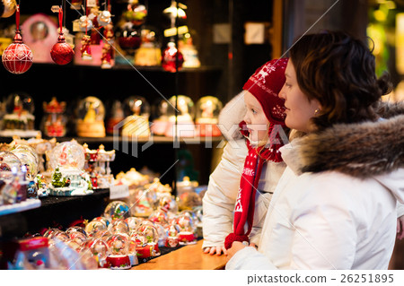 Mother and child on Christmas market Mother and child on Christmas market 26251895