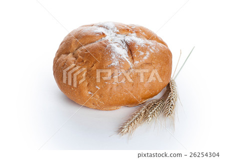 Homemade whole round bread and stalks of wheat Homemade whole round bread and stalks of wheat 26254304