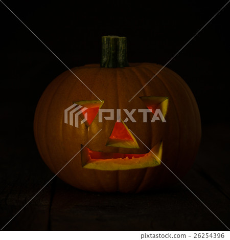 Scary Halloween Pumpkin carved with a face 26254396