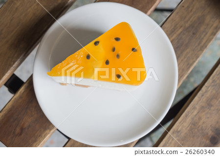 orange cake with orange topping 26260340