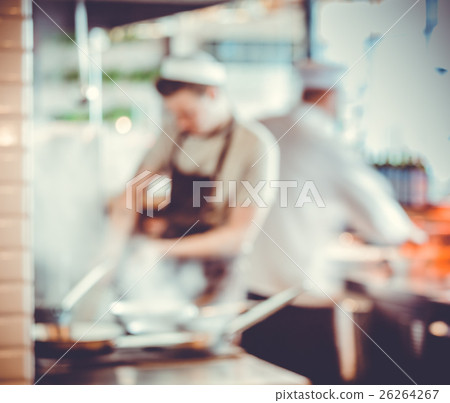 chefs cooking in the kitchen 26264267