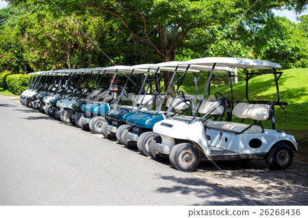 Golf carts waiting for service at the golf course Golf carts waiting for service at the golf course 26268436