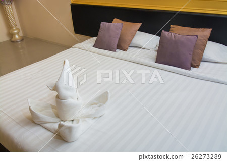 White towel on bed decoration in bedroom interior 26273289