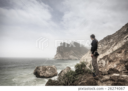 Woman watching the sea Woman watching the sea 26274067