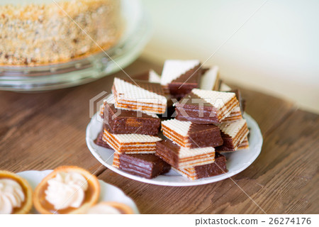 Close up, chocolate waffers and tarts with jam and 26274176