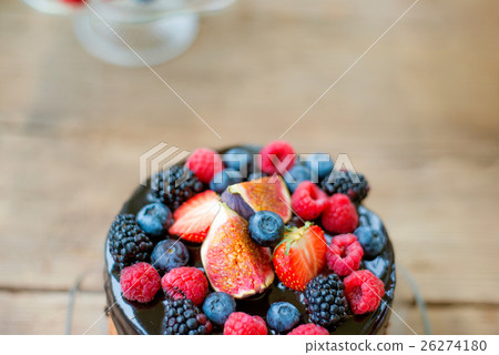Cake with chocolate and berries. Studio shot Cake with chocolate and berries. Studio shot 26274180
