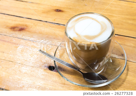 Closeup Hot coffee latte on wood background 26277328
