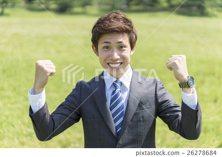  Businessman who plays guts pose 26278684