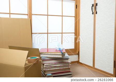 A stack of albums and a cardboard box A stack of albums and a cardboard box 26281066