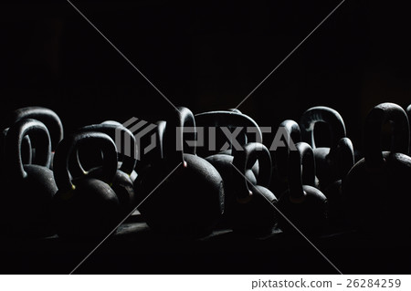 Silhouette Dumbbell for weight training in gym. Silhouette Dumbbell for weight training in gym. 26284259