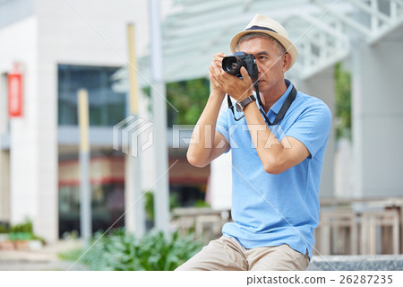 Photographing man Photographing man 26287235