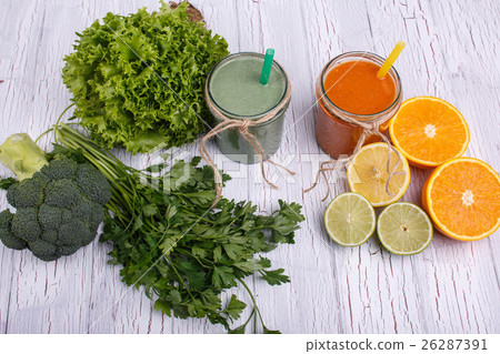 green and orange detox coctails stands  26287391