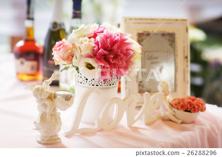 Tender decor of a table with lettering 'love',  26288296