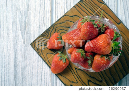 Strawberries in a bowl on a white background Strawberries in a bowl on a white background 26290987