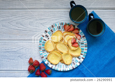 Pancakes strawberries and coffee 26290991