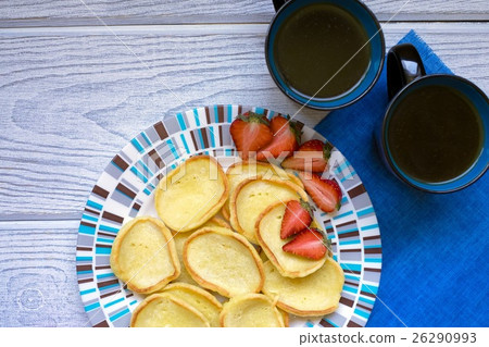 Pancakes strawberries and coffee 26290993