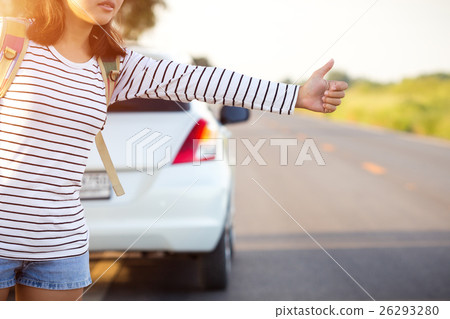 woman hitchhiking looking for help woman hitchhiking looking for help 26293280