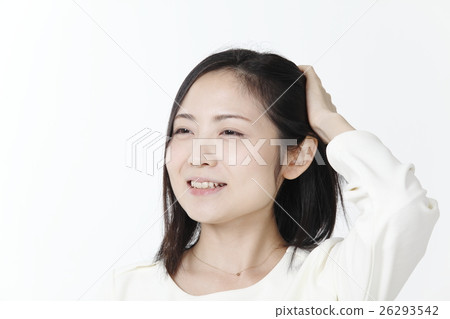 Young lady touching hair 26293542
