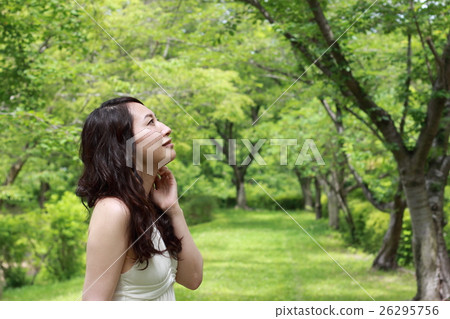 A young lady in fresh green 26295756
