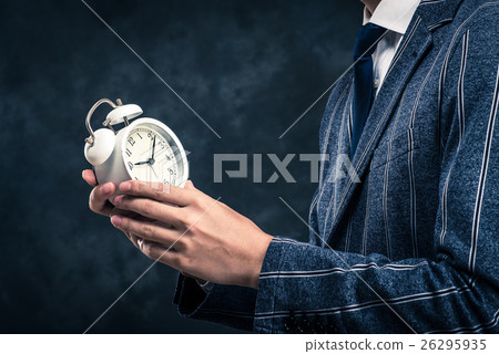 Businessman and time management Businessman and time management 26295935