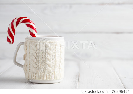 Knitted winter cup with candy cane Knitted winter cup with candy cane 26296495