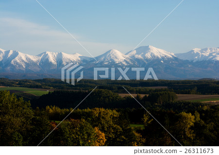 Autumn earth and crowned snowy mountains 26311673