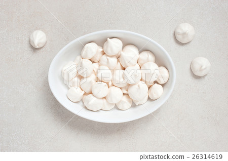White meringues on the white plate 26314619