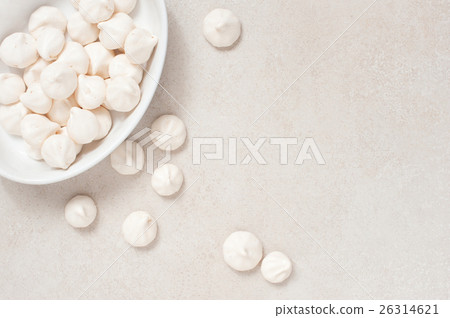White meringues on the white plate 26314621