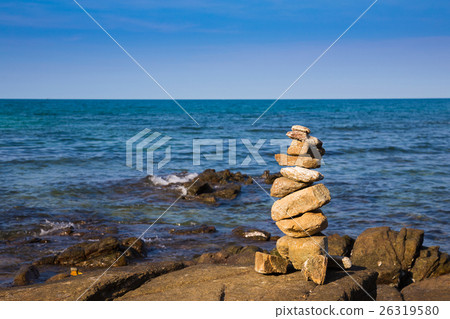 Stack rock with sea skyline background 26319580