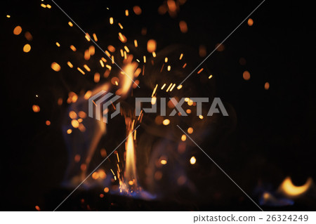 close up wood burning in the fireplace 26324249