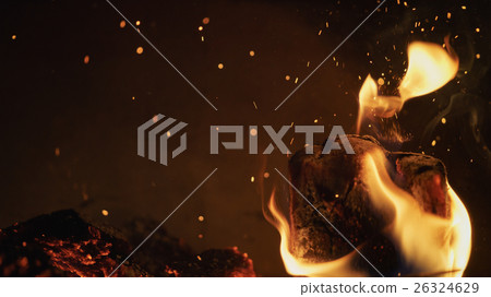 close up wood burning in the fireplace 26324629