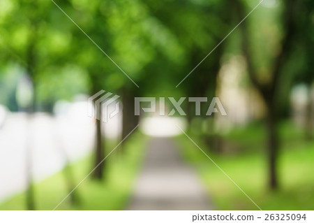 town alley with green trees background 26325094